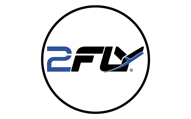 The logo for 2Fly in a black circle, with a stylised plane by the Y.